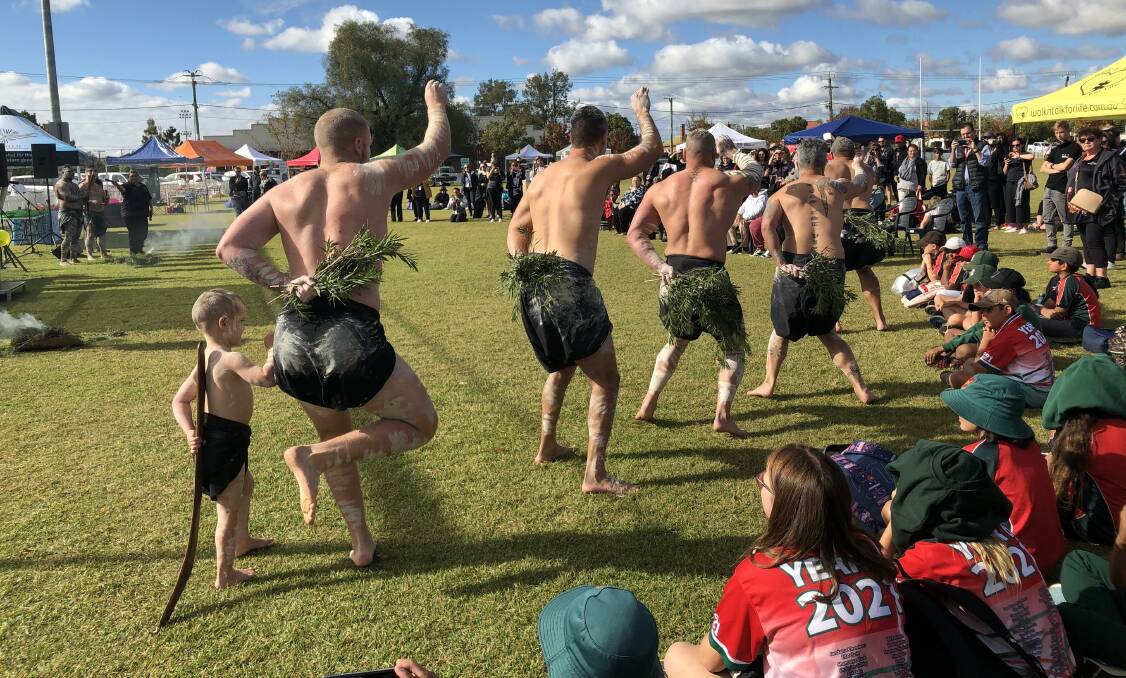 Indigenous dancers capture the full attention of the crowd at the opening ceremony of the National Sorry Day event at Dubbo. Photo: KIM BARTLEY.
