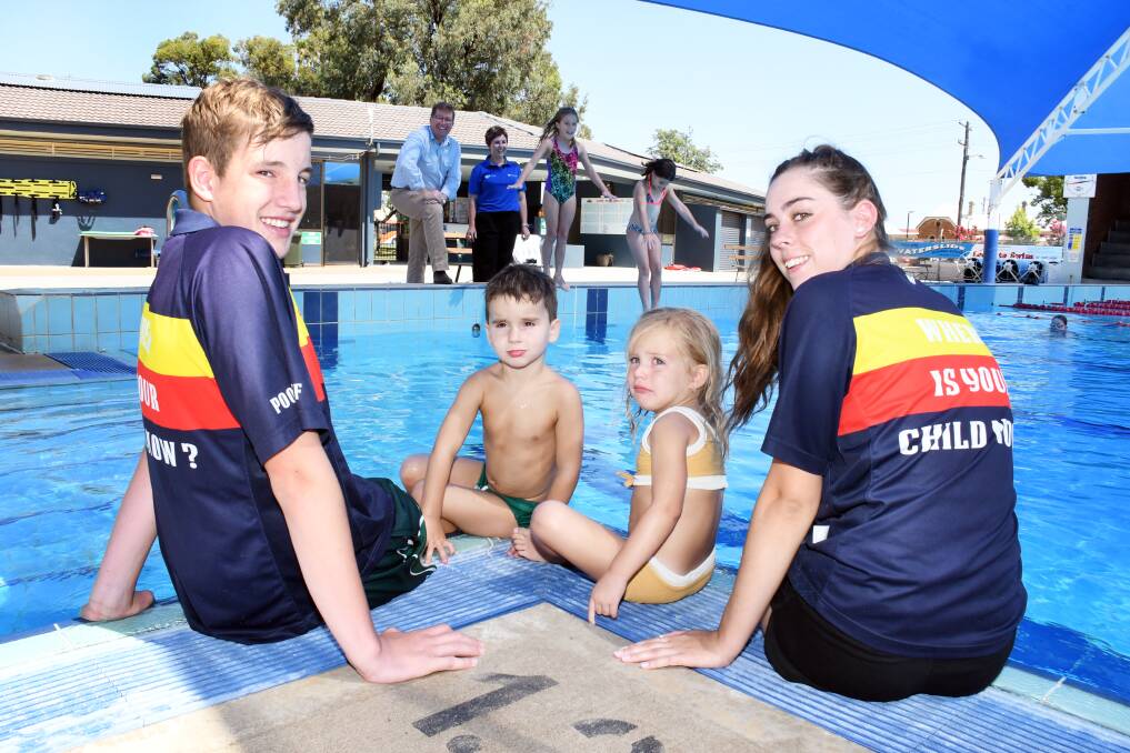 COOL NEWS: Deakin Wilson, Rio Wilson, Haven Kavanagh and Matilda Munn talk about  water safety as Troy Grant and Alison Middleton watch on. Photo: BELINDA SOOLE