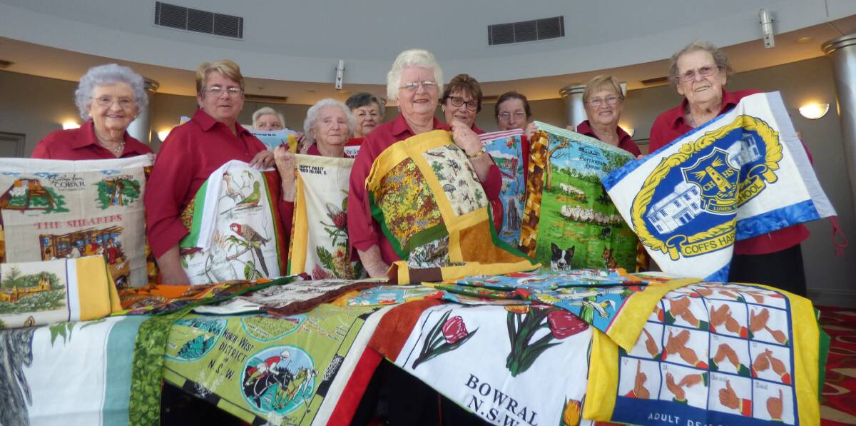 GIFT: Dubbo RSL Women's Auxiliary members including secretary Elizabeth Allen (centre front) show some of the laundry bags they have made for participants in the Sydney Invictus Games. Photo: KIM BARTLEY