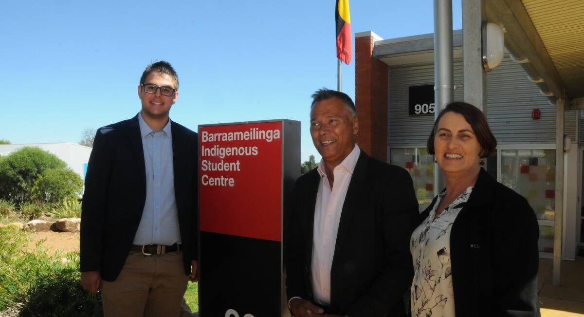 RETURNING: Journalist Stan Grant, pictured (centre) at Charles Sturt University's campus in Dubbo late last year, will return to the city to be keynote speaker at the  Bangamalanha Conference in September. Photo: JENNIFER HOAR