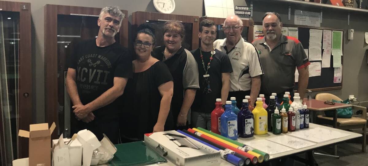 DONATION: Simon Lewis, Rachel Thomas, Christine Castlehouse, Nic Steepe, Barry Grady and Michael Russell meet up for the handover of art supplies. Photo: Contributed.