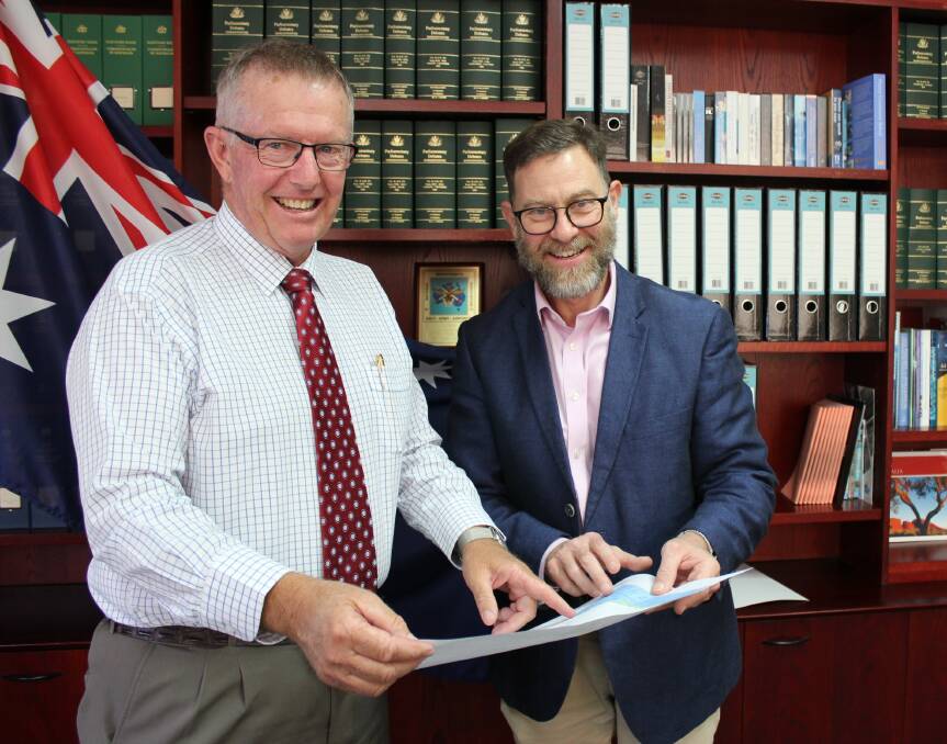 EXPANSION: Federal Member for Parkes Mark Coulton and Head of the School of Rural Health, Associate Professor Mark Arnold, talk about the establishment of the Graduate Rural School of Medicine in Dubbo. Photo: Contributed