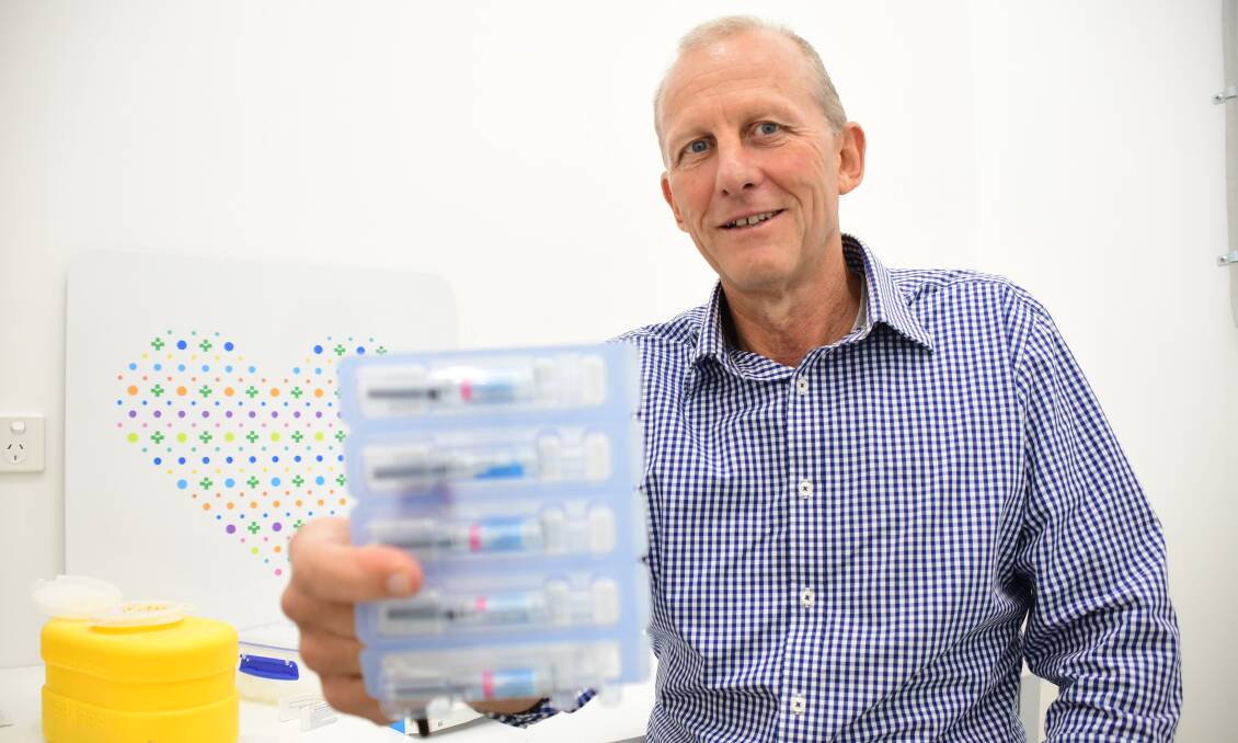 ALL ABOUT TIMING: Delroy TerryWhite Chemmart Pharmacy partner Tony Lawler is encouraging Dubbo residents to consider when best to have their flu and AstraZeneca jabs. Photo: AMY McINTYRE.