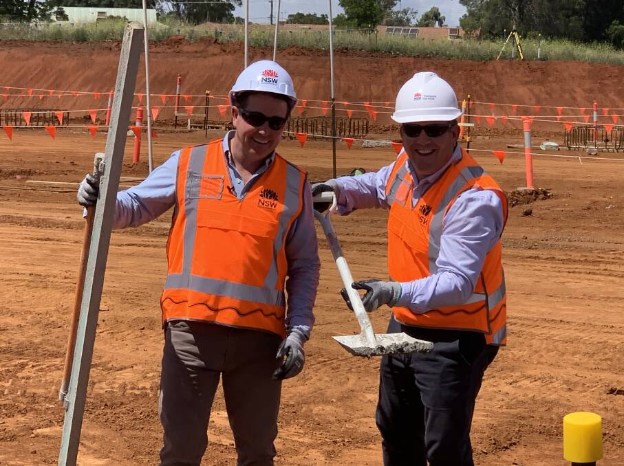 JOBS: Deputy Premier and Minister for Regional Transport and Roads Paul Toole and Member for the Dubbo electorate Dugald Saunders are pictured at the construction site of the maintenance centre. Mr Toole says its construction will generate 200 jobs. Photo: CONTRIBUTED.
