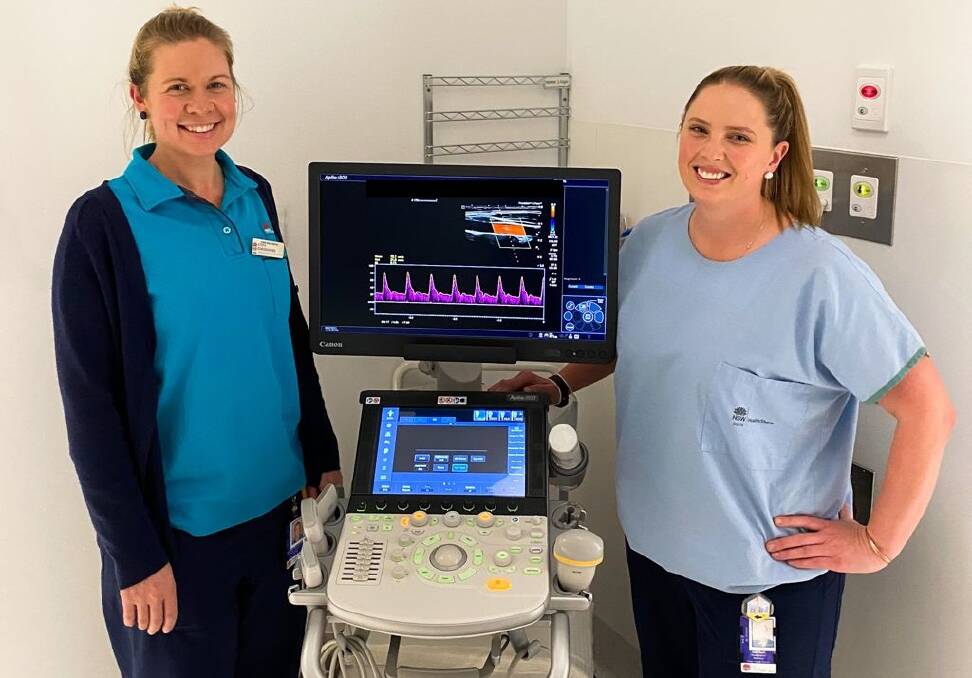 NEW ULTRASOUND MACHINE: Dubbo Hospital sonographers Stephanie Steele and Katie Rush check out the new ultrasound machine. Photo: CONTRIBUTED. 