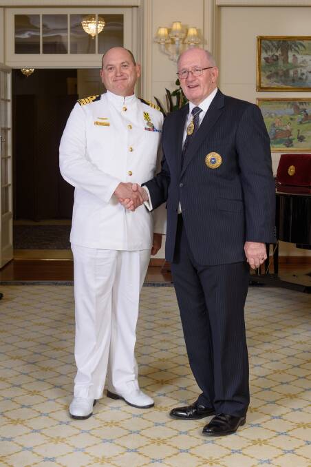 AWARD: Captain Anthony Klenthis of the Royal Australian Navy receives his Conspicuous Service Cross from Governor-General Sir Peter Cosgrove. Photo: Contributed