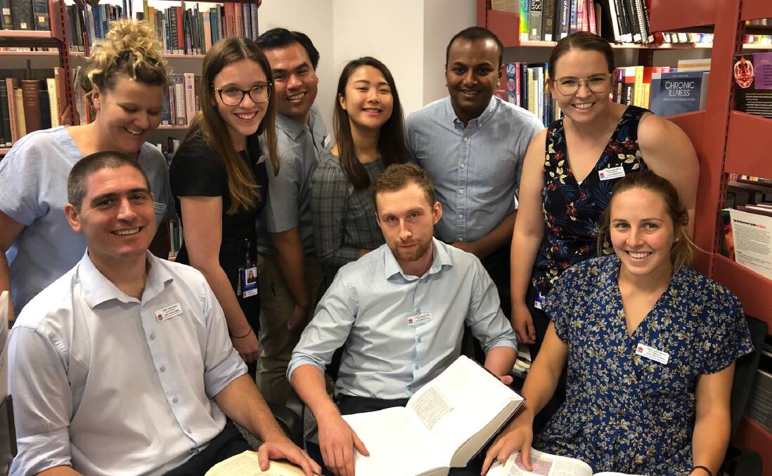 HAPPY TO BE HERE: Wellington-born Jason Trounce (front, left) is pictured with fellow interns at Dubbo Hospital. Photo: KIM BARTLEY