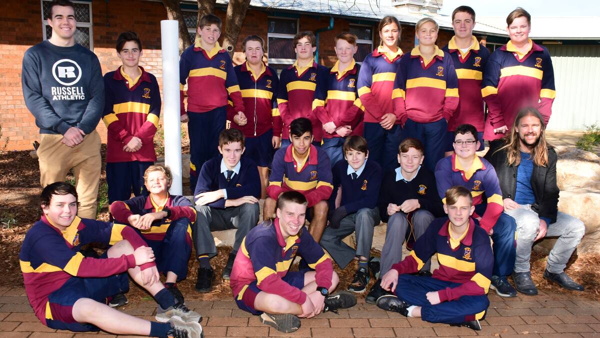 STEP UP: The St Johns College Year 8 boys, teacher's aide David Heywood (back row, left) and teacher Kirk Watts (middle row, right) gather together on the eve of the trek. Photo: BELINDA SOOLE