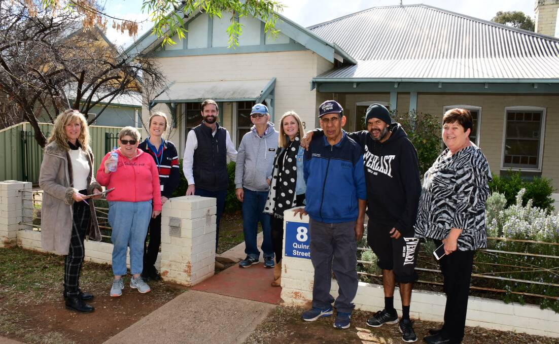 NEW START: Karen-Lea Delaney, Jane Jaegar, Alana Cameron, Tim Sykes, Tony O'Brien, Alli Sykes, Tom Lynnette, Kevin Adams and Pam Cook check out the Quinn Street houses now owned by Westhaven. Photo: BELINDA SOOLE