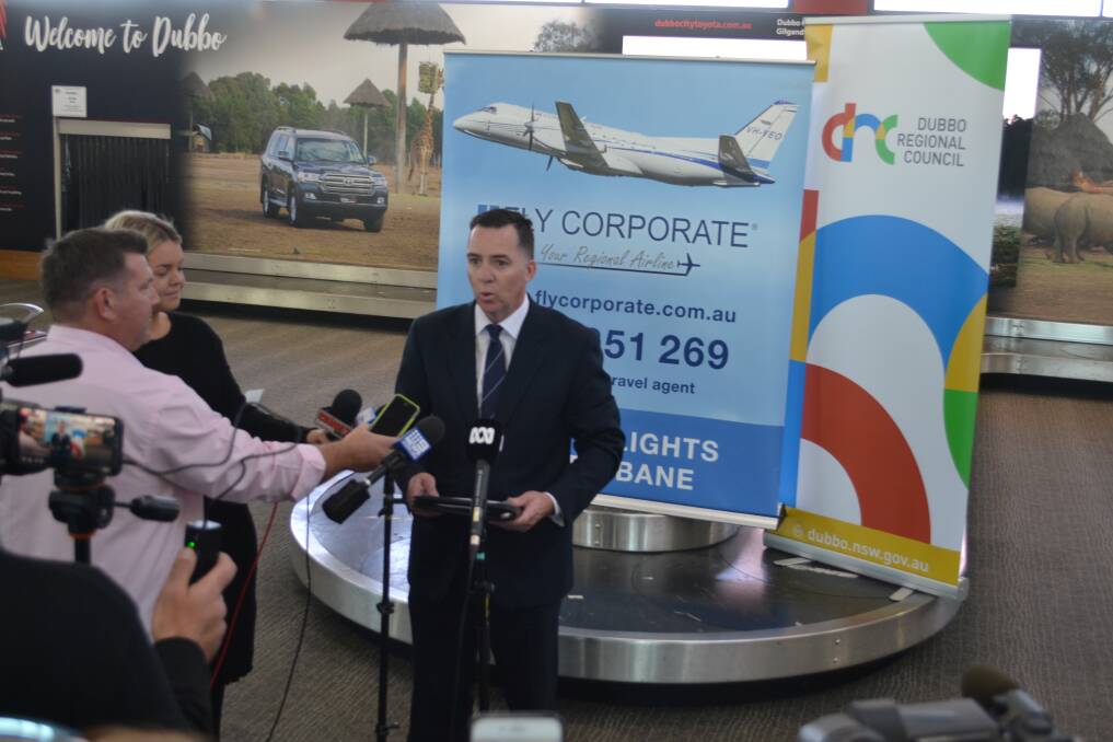 ANNOUNCEMENT: Fly Corporate's sales manager Geoff Woodam announces flights from Dubbo to Brisbane and Melbourne during a media conference at Dubbo City Regional Airport on Wednesday. Photo: Craig Thomson