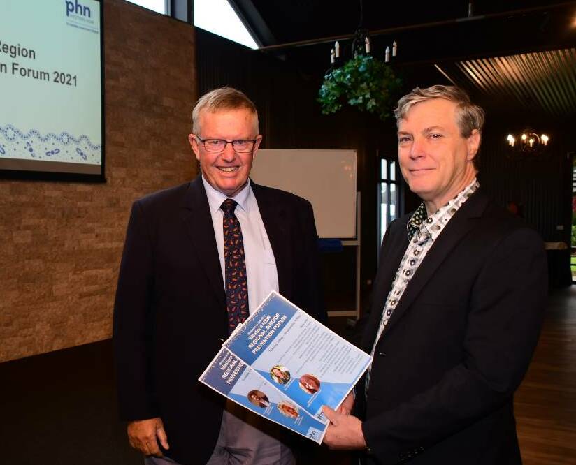 GRANTS: Federal Member for Parkes and Regional Health Minister Mark Coulton and acting chief executive officer of the Western NSW Primary Health Network Robert Strickland are promoting its community well-being grants. Photo: FILE.