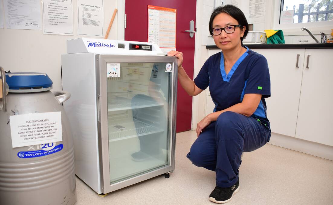 VACCINE: Dr Ai-Vee Chua inspects the fridge at Dubbo Family Doctors where the AstraZeneca vaccine will be stored. Photo: AMY McINTYRE