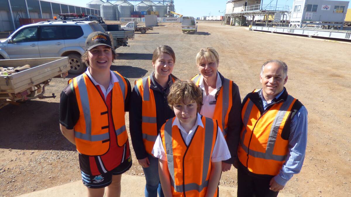 TOUR: At Fletcher International Exports' intermodal terminal are Nash Rodda, Fletcher International Exports employee Courtney Power, TAFE NSW's Lisa Austin, Transport for NSW's Brendon Reynolds and Bailey Williams. 