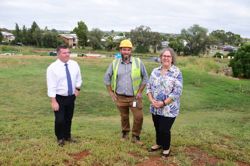 SITE: Member for the Dubbo electorate Dugald Saunders, Hansen Yuncken site manager Chris Histon and Dubbo Hospital general manager Debbie Bickerton on the hospital site earmarked for a multi-storey car park. PHOTO: Amy McIntyre.