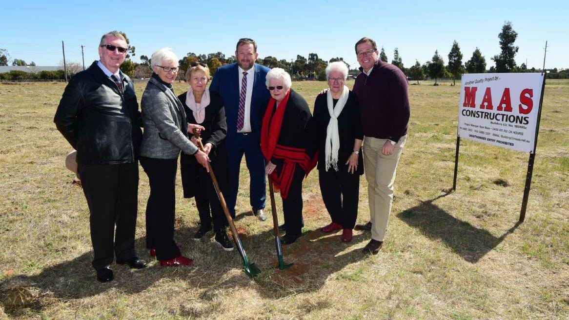 Ray Nolan (left) attends the first sod turning ceremony for Macquarie Home Stay in 2017. Photo: BELINDA SOOLE