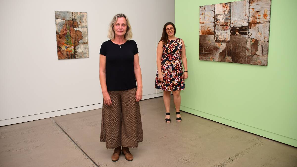 Artist Anna Nordstrom and Western Plains Cultural Centre curator Mariam Abboud confer on the exhibition. Photo: AMY MCINTYRE.