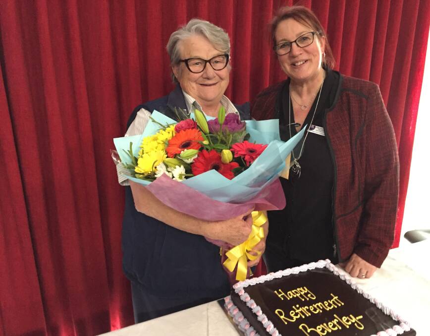 FOND FAREWELL: Beverley Sparkes is congratulated on her 52-year nursing career and her contributions to the profession by Dubbo Hospital's acting director of nursing Tracy Wittich. Photo: KIM BARTLEY