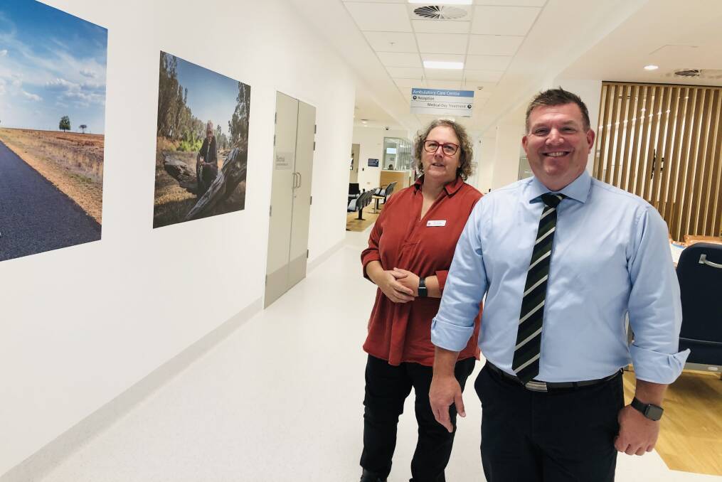 BRAND NEW: Dubbo Hospital general manager Debbie Bickerton shows state Member for the Dubbo electorate Dugald Saunders the new ambulatory care unit which takes up level one of the Macquarie Building. Photo: KIM BARTLEY