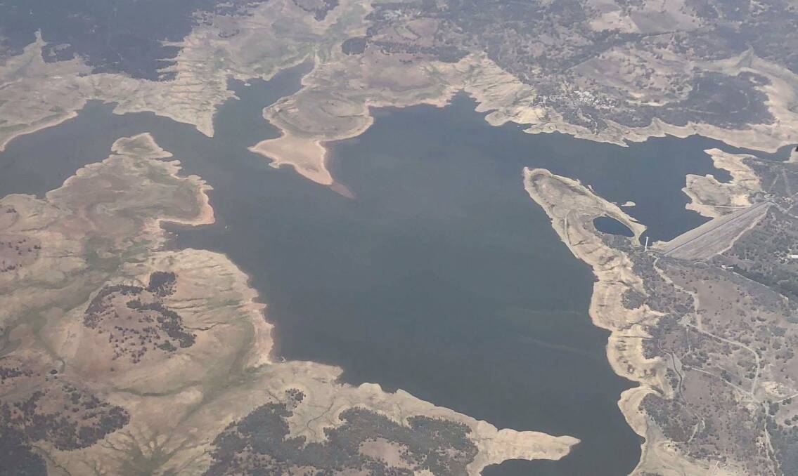 DAM PLAN: An aerial photograph taken about eight weeks ago shows how water in Burrendong Dam has contracted. Photo: MATT HANSEN
