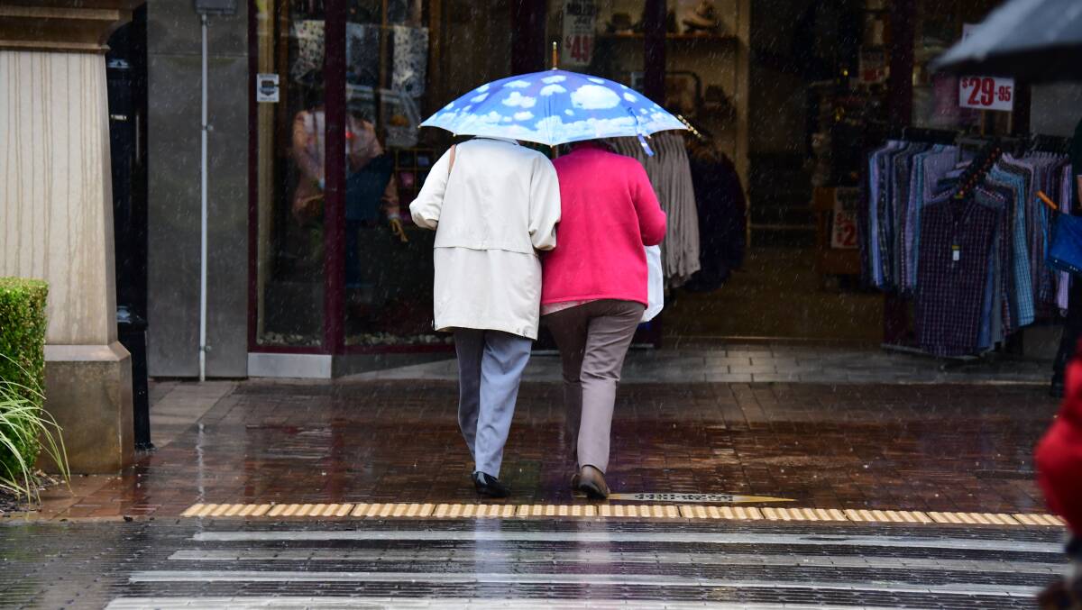 OUT IN FORCE: Umbrellas were out in force in Dubbo on Thursday as 51.4mm of rain was collected at Dubbo City Regional Airport. Other Western NSW communities which received rain this week included Bourke where 75mm was recorded Photo: BELINDA SOOLE