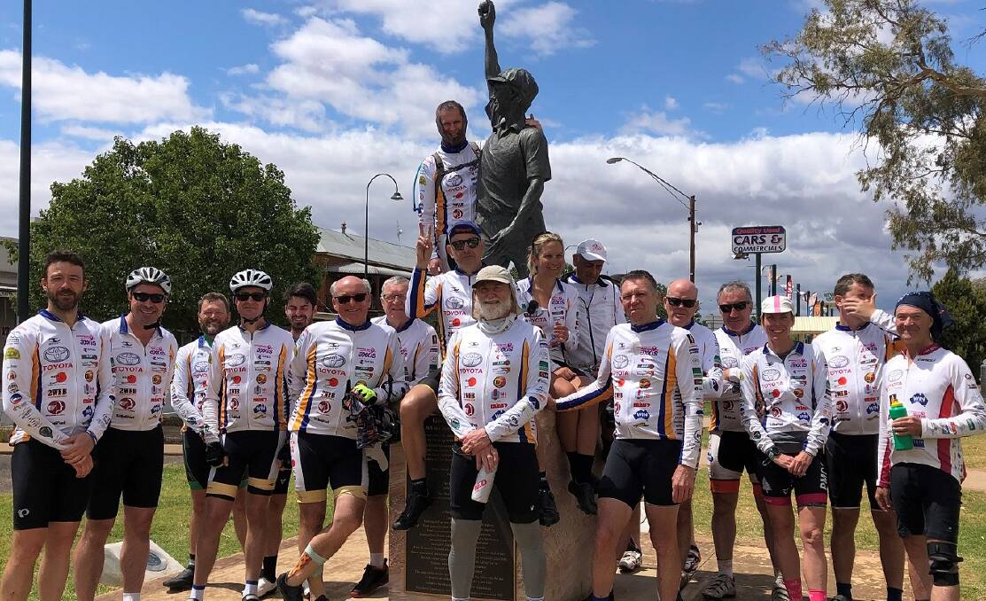 IT'S ON AGAIN: The riders in the 2019 Tour de OROC stop off in Narromine and check out the Glenn McGrath statue. PHOTO: Contributed. 