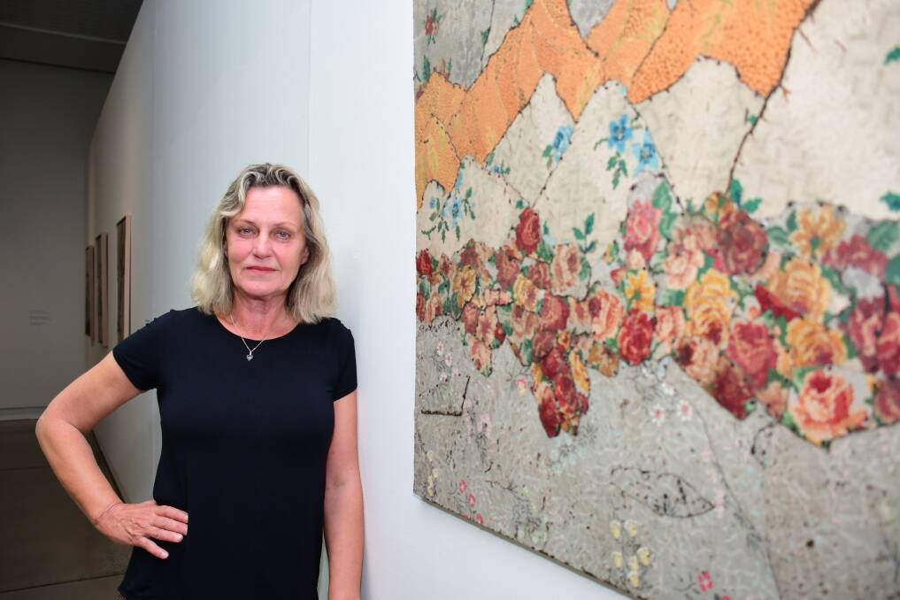 EXHIBITION: Artist Anna Nordstrom stands near one of the 24 pieces in her exhibition called Sang Into Existence, showing at Western Plains Cultural Centre until November 22. Photo: AMY MCINTYRE.