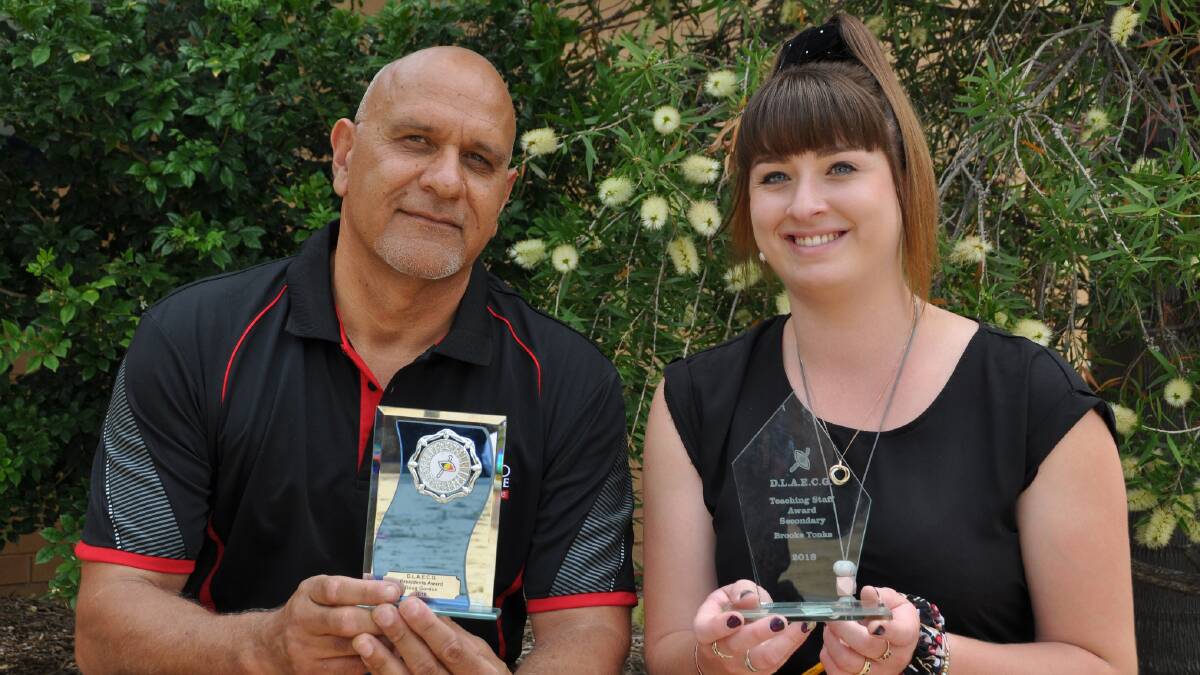 AWARDS: Dubbo College Delroy Campus staff  Doug Gordon and Brooke Tonks hold their Dubbo Aboriginal Education Consultative Group awards. Photo: Contributed 