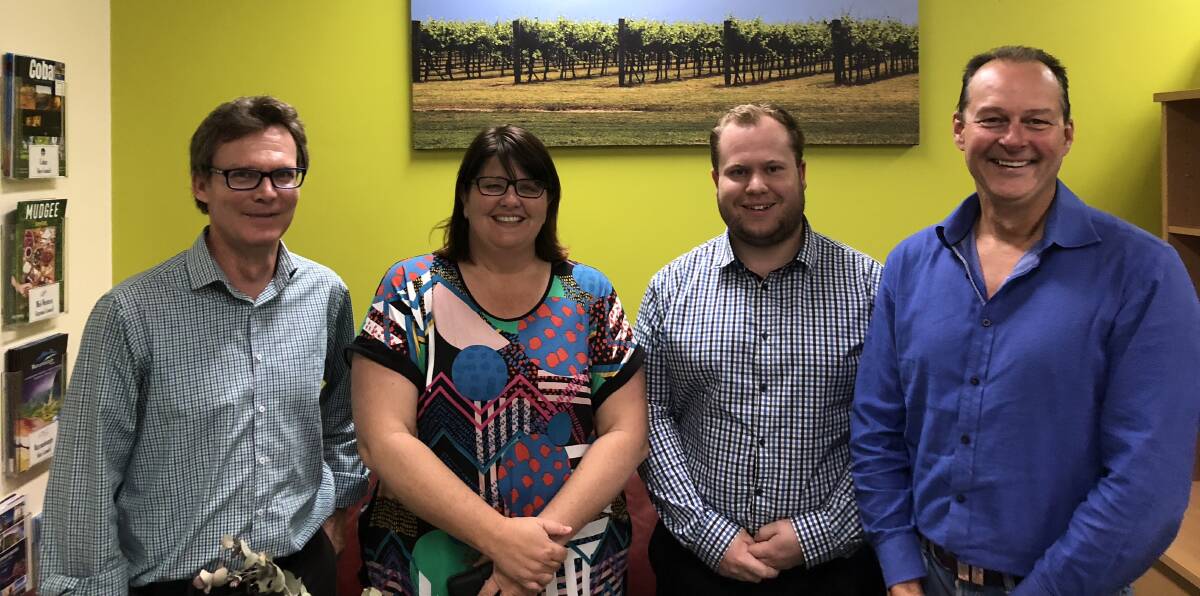 WARM WELCOME: RDA Orana director Megan Dixon welcomes Central NSW Business HQ's Wayne Sunderland, Daniel Fisher and Andy Banks to Dubbo. Photo: Contributed
