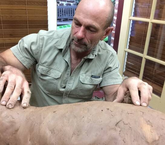 HANDS ON: Brett Garling, pictured in his Wongarbon workshop, has been commissioned to create the William "Bill" Ferguson bronze statue for installation at Dubbo's Church Street rotunda. Photo: Contributed

