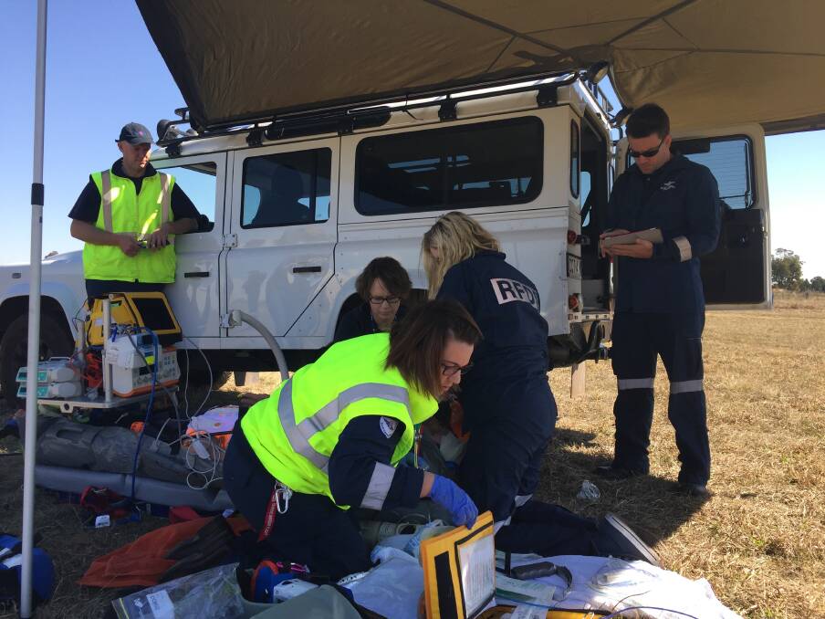 INTENSIVE TRAINING: Royal Flying Doctor Service registrars treat a patient during a medical emergency simulation. Photo: Contributed