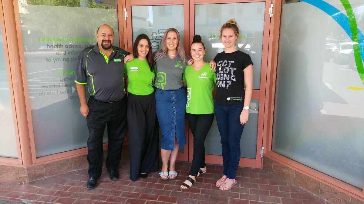 TEAM HEADSPACE Dubbo: Staff at headspace Dubbo, Kevin Saul, Alisha Ondrovcik, Marijka Brennan, Tayla Matthews and Christina Rodgers, are working with Marathon Health on a series of workshops. Photo: Contributed.  
   