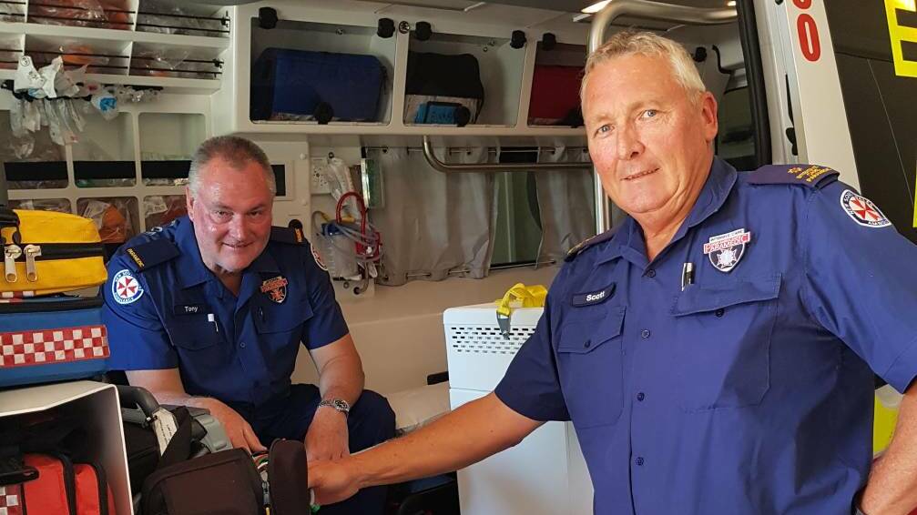 LEFT SHORT: Gilgandra paramedic Scott Beaton (right) has accused the NSW Government of playing politics over the transfer of Central West paramedics to Wagga Wagga. Photo: SUPPLIED