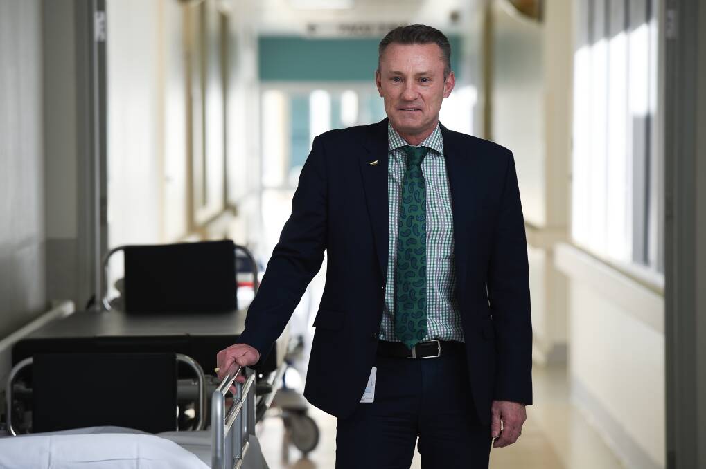 Left in limbo: Wangaratta hospital interim chief Tim Griffiths is being forced to operate his hub without a chunk of staff due to rules not allowing NSW people into Victoria without them having to quarantine upon returning.