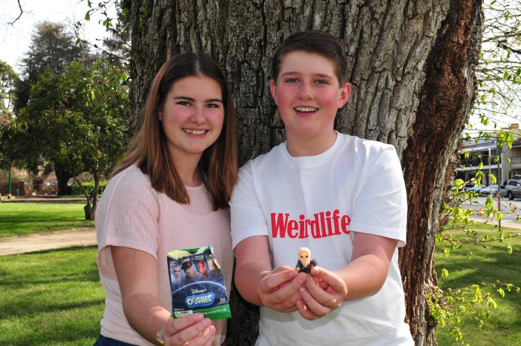 LUCKY FIND: Alycia Cogdell, 14, and her brother Jaiden, 12, didn't realise they had a rare Ooshie until younger kids at school told them. 