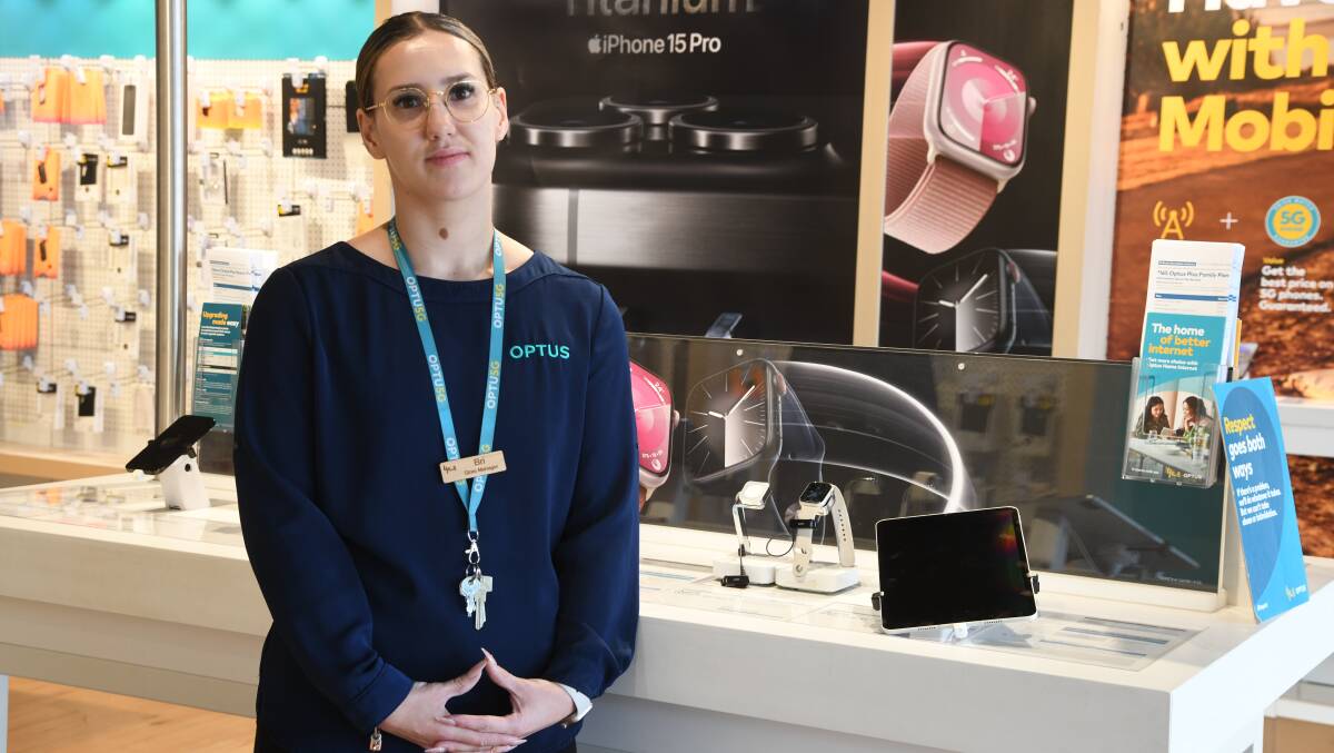 Optus Orange store manager Bree Wells was assisting a customer when an opportunist thief took off with an Apple Watch. Picture by Jude Keogh