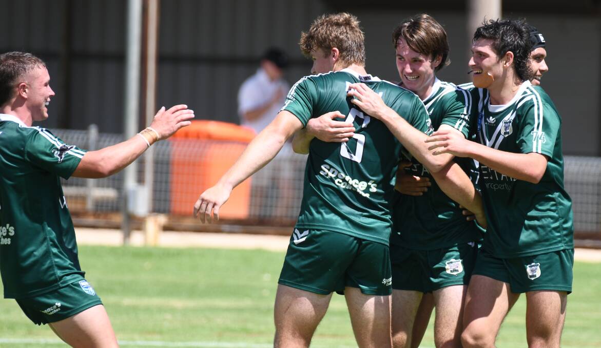 Western Rams celebrate a try. Picture by Jude Keogh