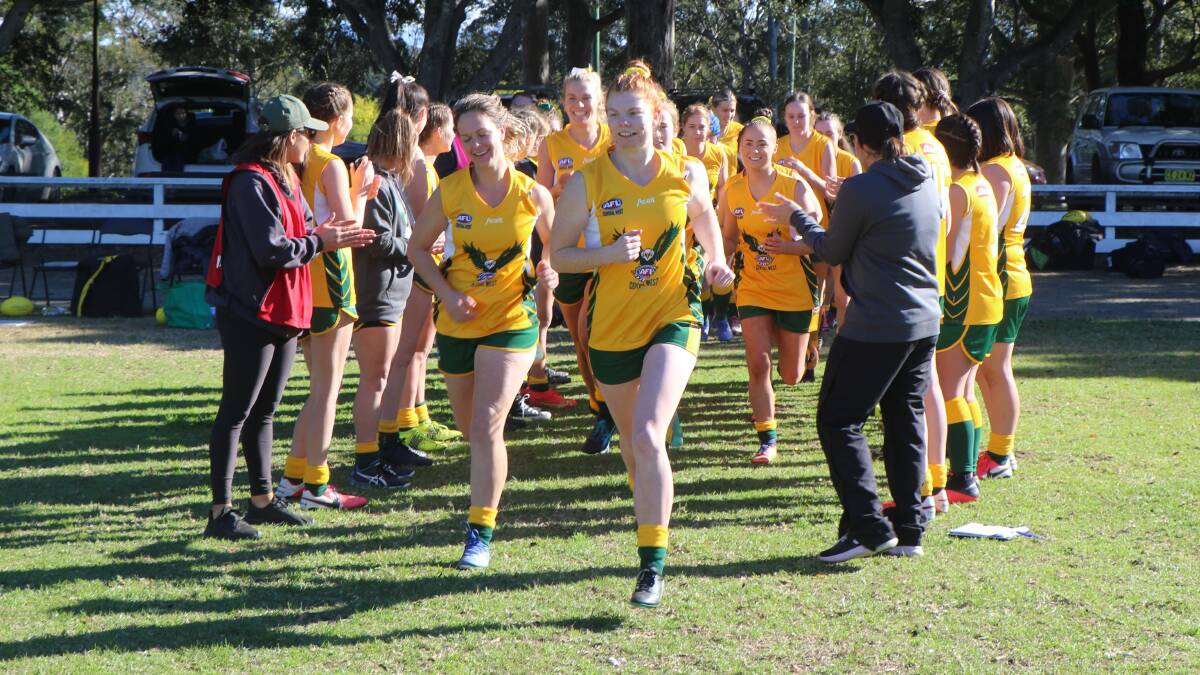 CANNED: The AFL Central West Eagles women's side running onto the park for their clash with the Sapphire Coast in 2021. Photos: BEN NEELY, AFL CENTRAL WEST MEDIA