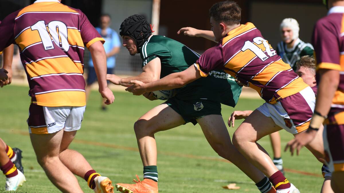 Will Giovas runs the ball for Western Rams at Cowra's Sid Kallas Oval. Picture by Jude Keogh