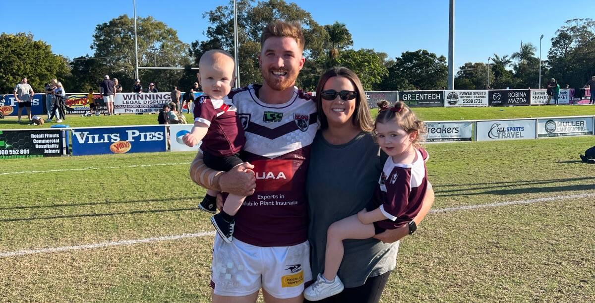 Dylan Kelly holding his son Brooks alongside his wife Lauren and daughter Addison. Picture supplied