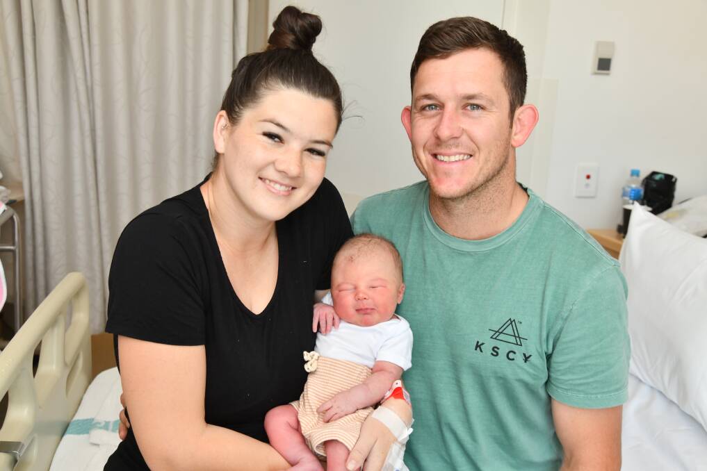 Amy and Raymond White are all smiles 24 hours after the birth of their first son, Charlie White. Picture by Jude Keogh.