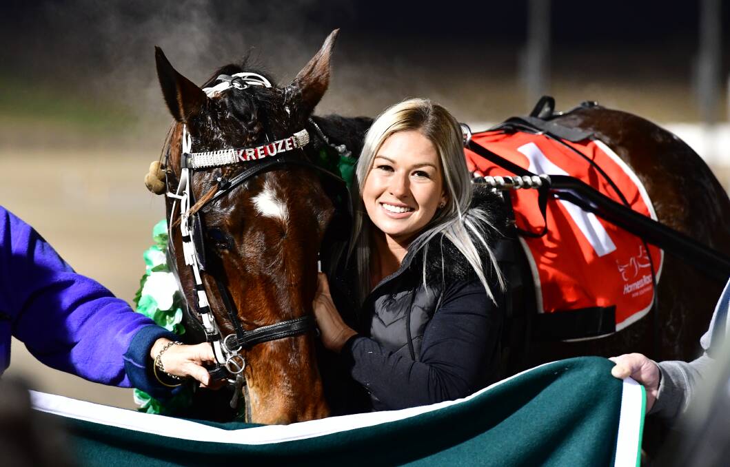 BREAKTHROUGH: Gemma Hewitt is all smiles following her maiden Group 1 victory on Wednesday night with Keayang Kreuzer. Photo: ALEXANDER GRANT