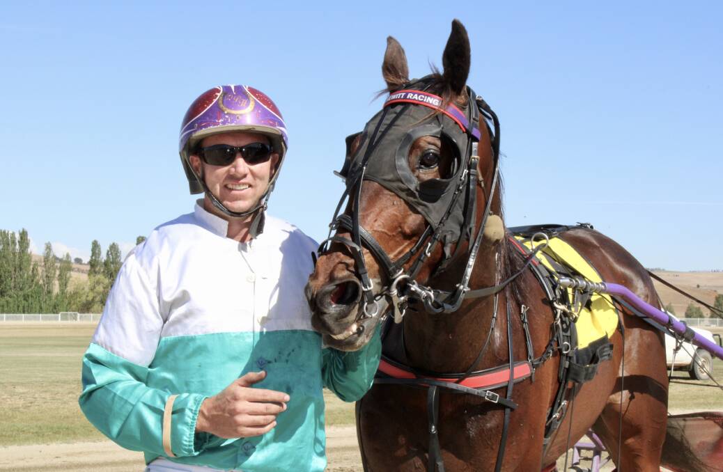 HOLDING ON FOR VICTORY: Winning driver Jason Hewitt with Billy Soo Memorial Blayney Cup champion Scarlet Babe. Photo: AMY REES