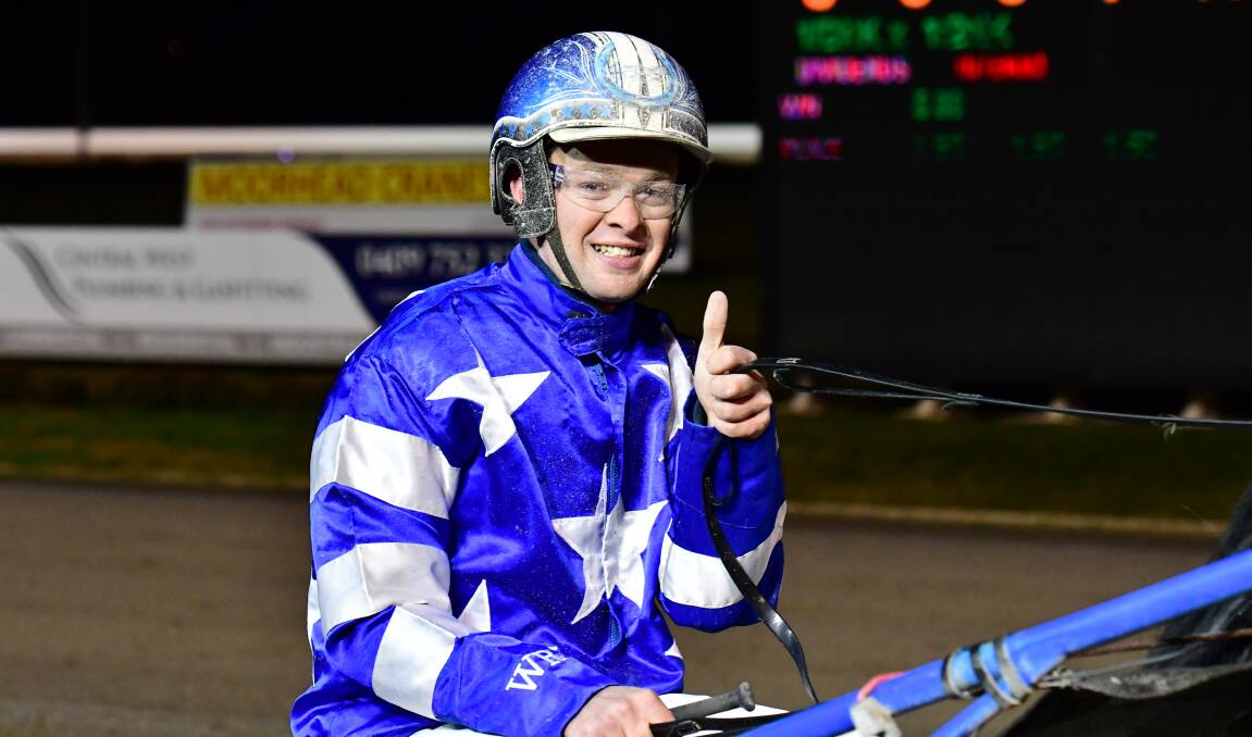 THUMBS UP: Tom Pay drove home Authoritative to victory at Wednesday night's meeting at Bathurst Paceway. Photo: ALEXANDER GRANT