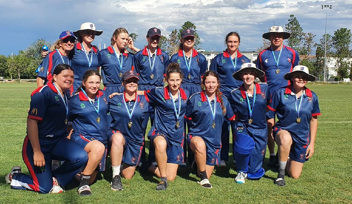 WE DID IT: The Western under 16s celebrate their Country Championships title on Tuesday.