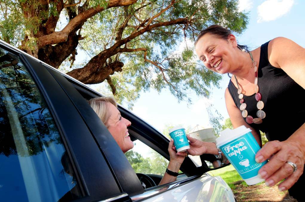 HAVE A CUPPA: Jayne Bleechmore, road safety officer for Gilgandra, Wellington and Dubbo with Suzanne Grattan. Photo: FILE