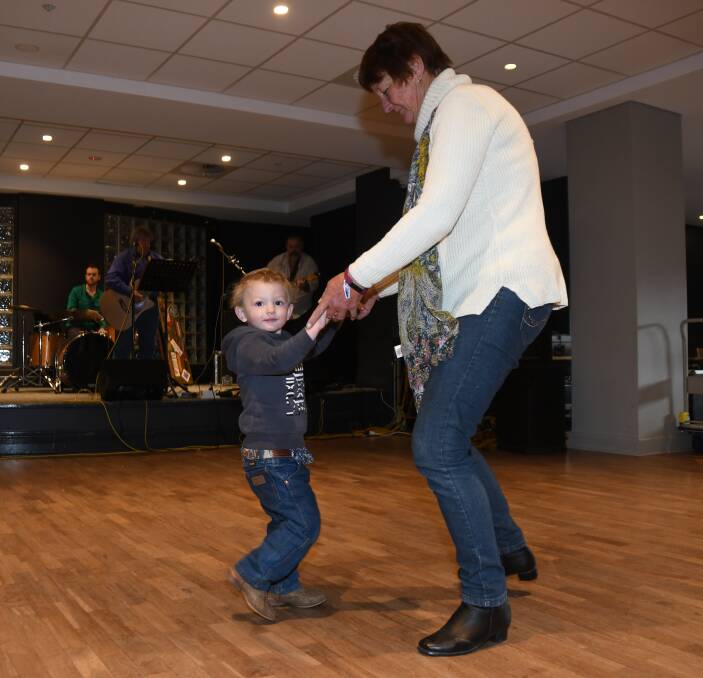 Boot scootin': Jock Tink and Denise Pye enjoying the Orana Country Music Association's monthly hoedown. Photo: Amy McIntyre
