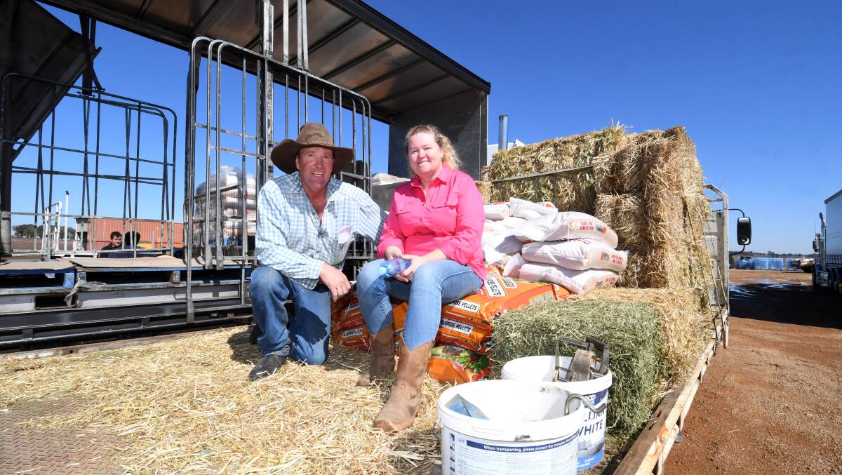 Welcome relief: Local farmer Kieran Turnbull with Nowra to Dubbo Drought Relief Drive organiser Leeanne Oldfield. Photo: Belinda Soole