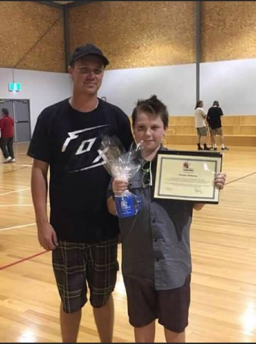 FATHER AND SON: Chris Reinsma with son Tristan at his year 6 graduation. Tristan was 11 at the time. Picture: CONTRIBUTED