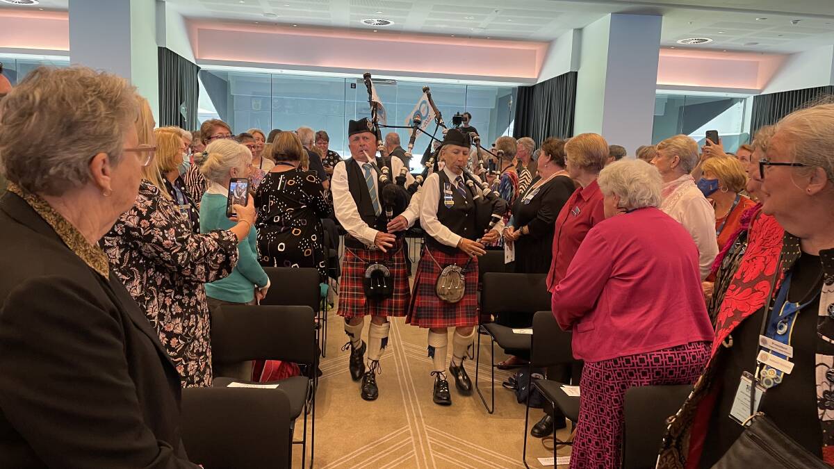 The conference starts with some bagpipes.