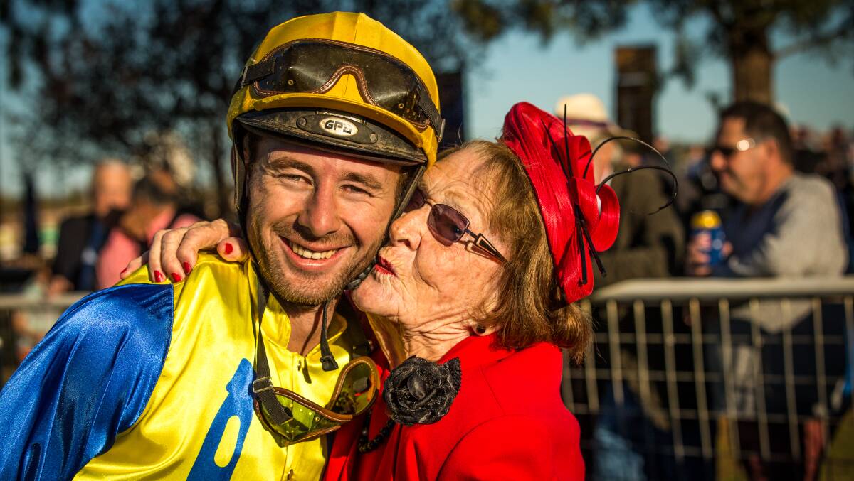 A big kiss from Lilliane for jockey Kody Nestor after he steered Magic Bella to win the 2015 Cobar Cup. Photo by Janian McMillan.